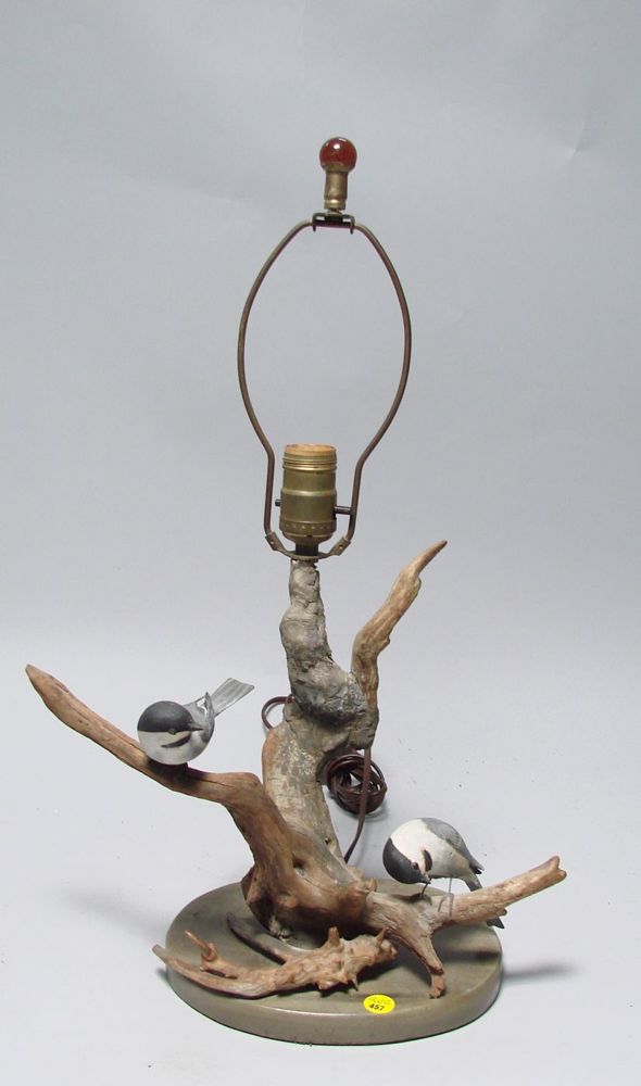 Appraisal: TWO BIRD CARVINGS MOUNTED AS A LAMP Two chickadees by