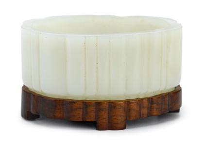 Appraisal: Chinese white jade brush washerOf ribbed cylindrical form wide rim