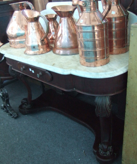 Appraisal: A Victorian washstand the cloud shaped white marble top with