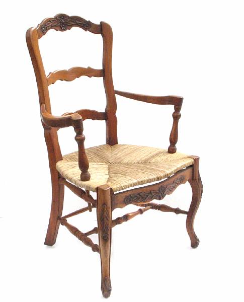 Appraisal: A pair of two French provincial style armchairs height in