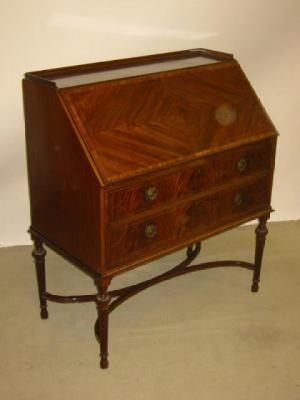 Appraisal: A MAHOGANY BUREAU crossbanded with stringing moulded three quarter gallery