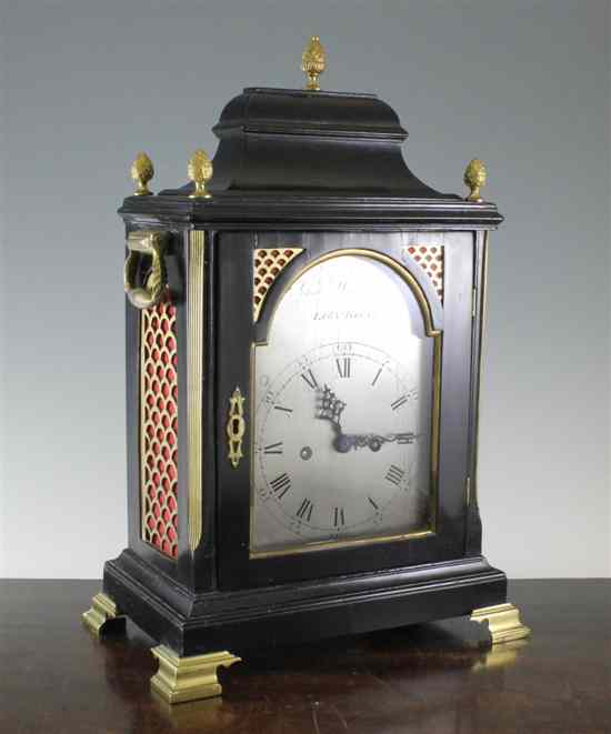 Appraisal: A George III ebonised bracket clock with arched silvered Roman