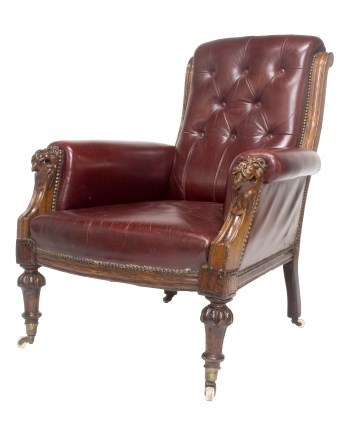 Appraisal: A Victorian rouge leather upholstered mahogany framed easy armchair with