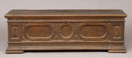 Appraisal: ITALIAN BAROQUE CARVED WALNUT CASSONE The hinged top above a