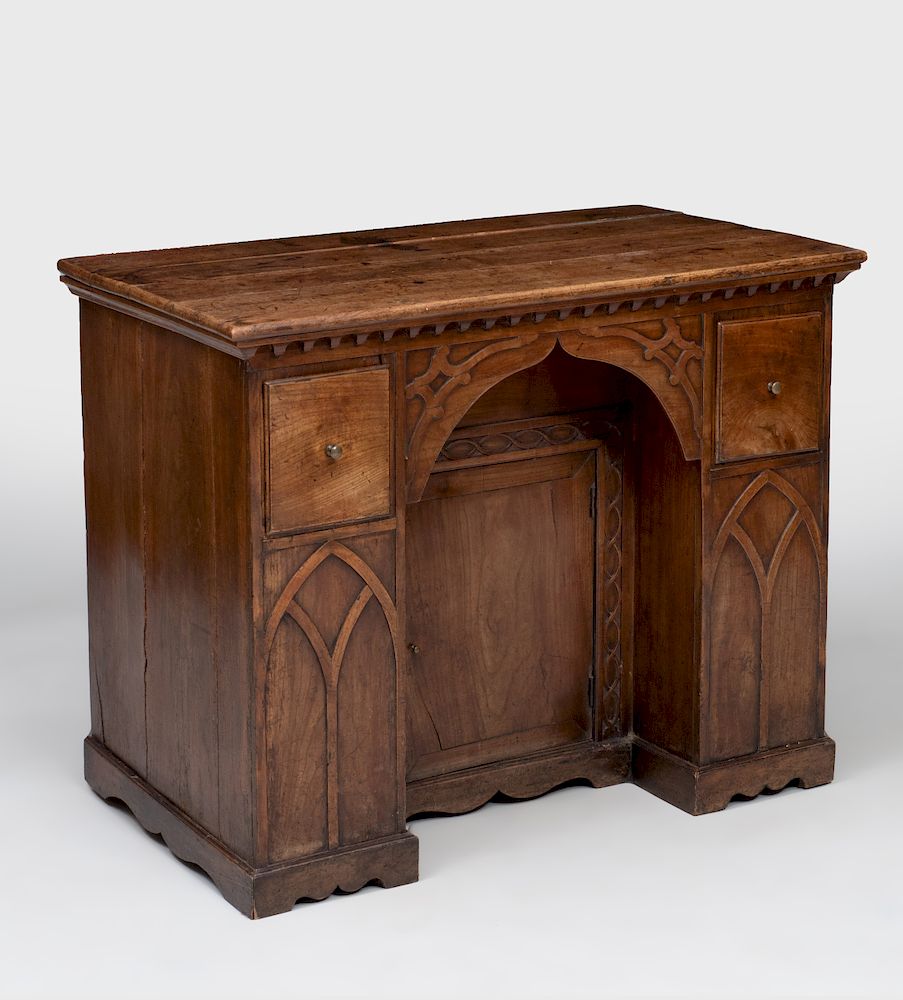 Appraisal: Neogothic Fruitwood Kneehole Desk Small compartment in kneehole flanked by