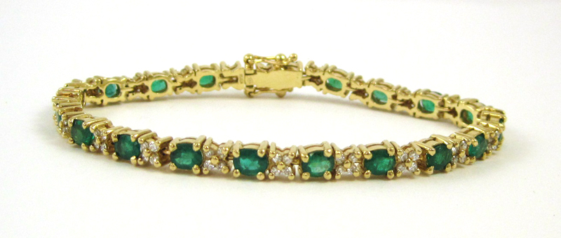 Appraisal: EMERALD AND EIGHTEEN KARAT GOLD BRACELET measuring - inches in