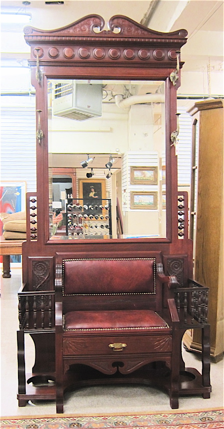 Appraisal: VICTORIAN MAHOGANY SETTLE HALLSTAND American late th century having an