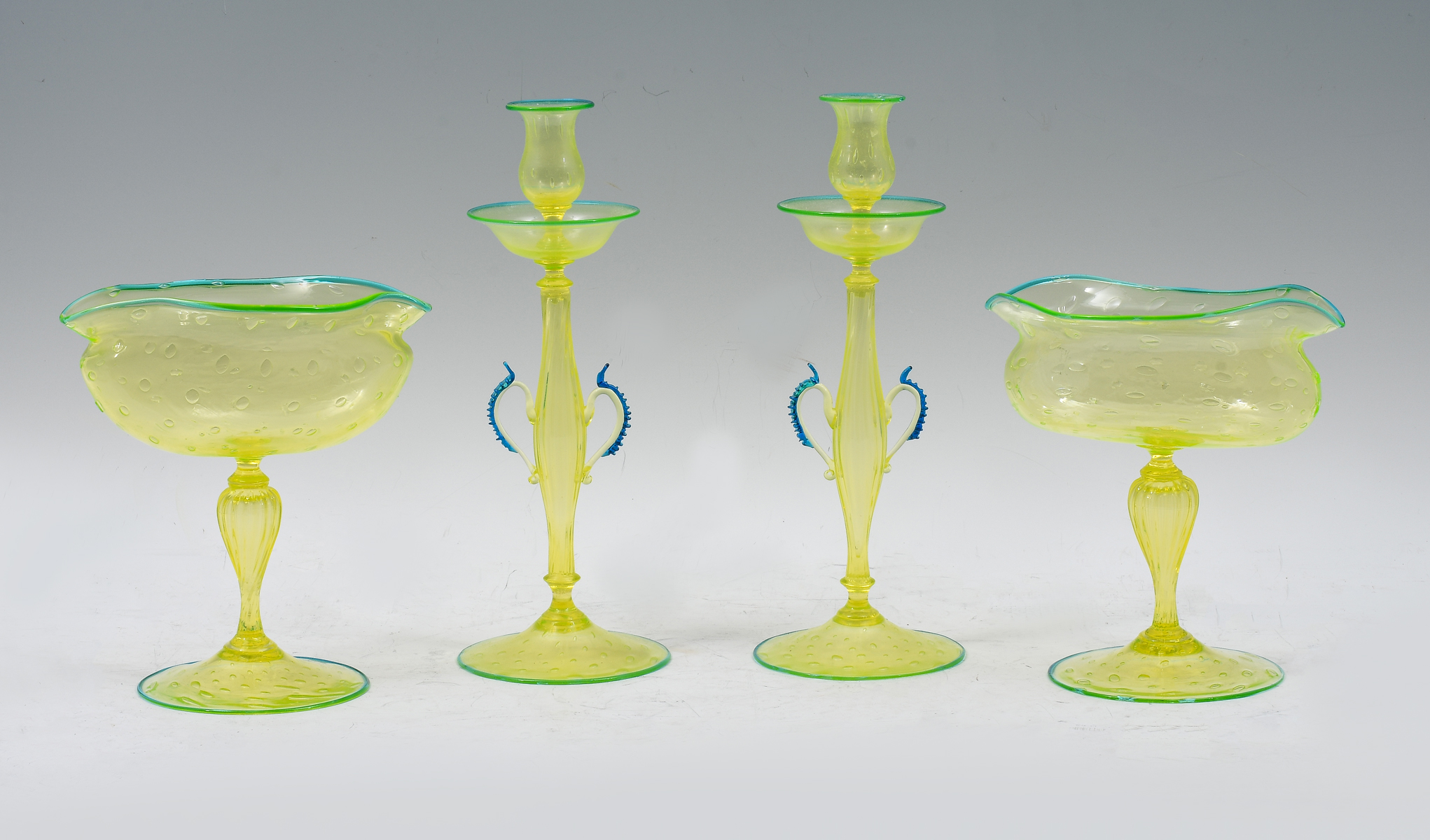 Appraisal: PC VENETIAN VASELINE GLASS Comprising - Candlesticks - Compotes All