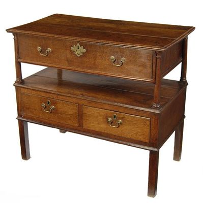 Appraisal: A George III oak buffet the rectangular planked top with