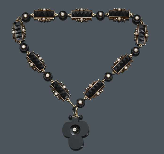 Appraisal: An antique black onyx cultured pearl enamel diamond and fourteen