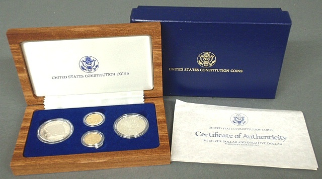 Appraisal: - U S Mint four-piece coin set silver dollar and