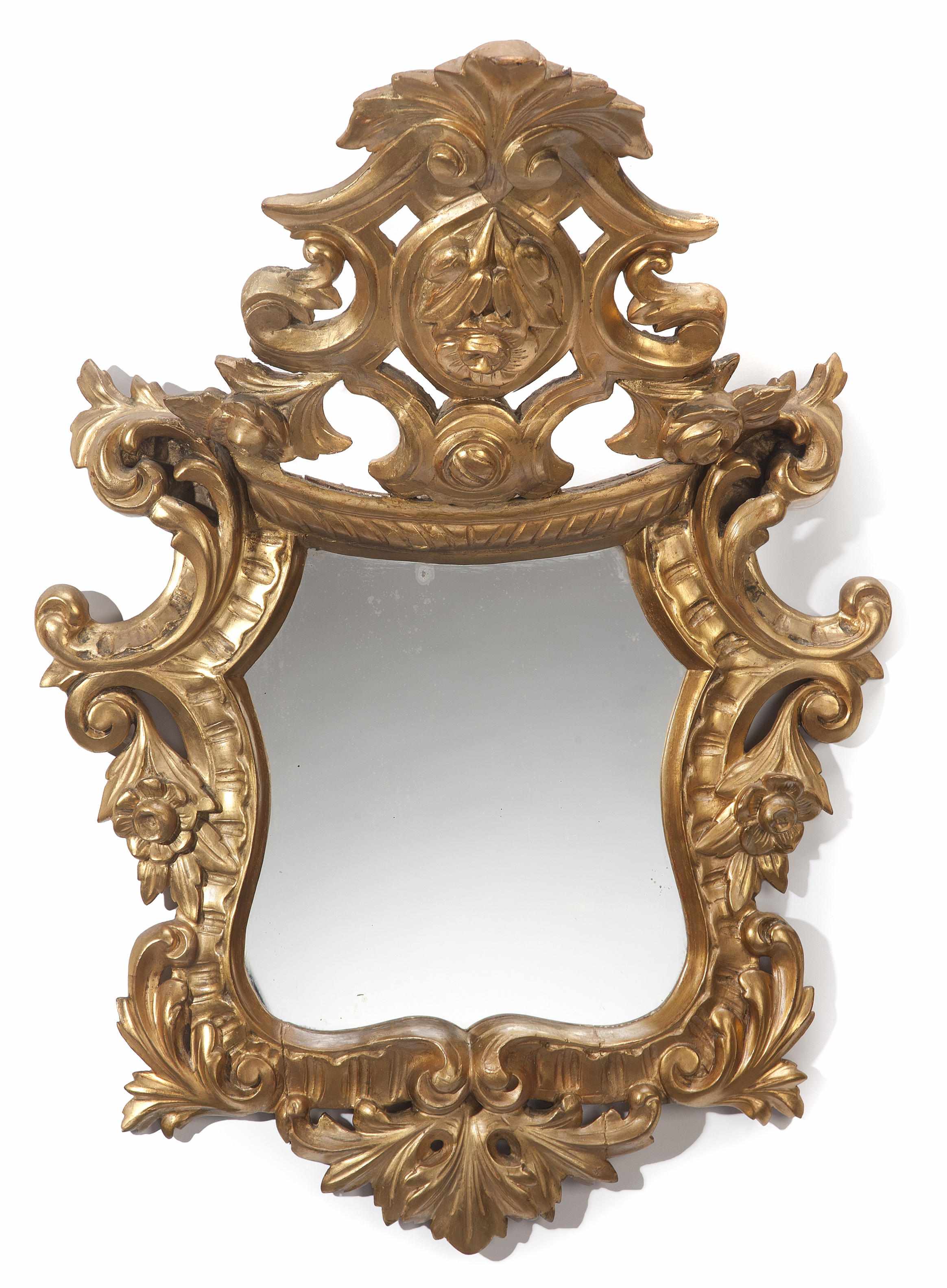 Appraisal: An Italian Baroque style carved giltwood mirror height in cm