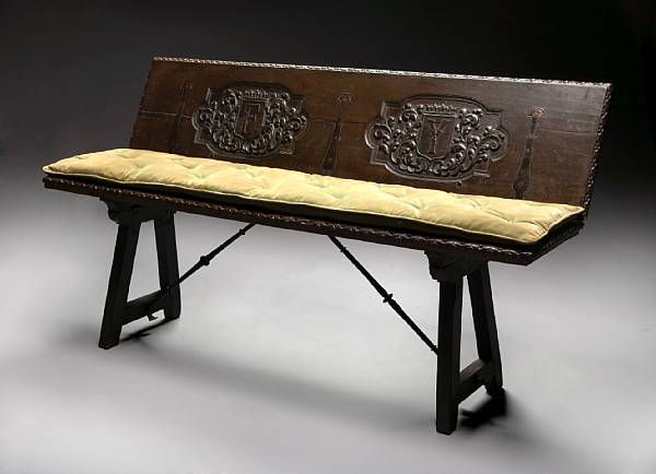 Appraisal: A Spanish Baroque iron mounted walnut folding bench partially incorporating