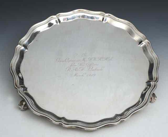 Appraisal: A SILVER SALVER of circular form with piecrust border on