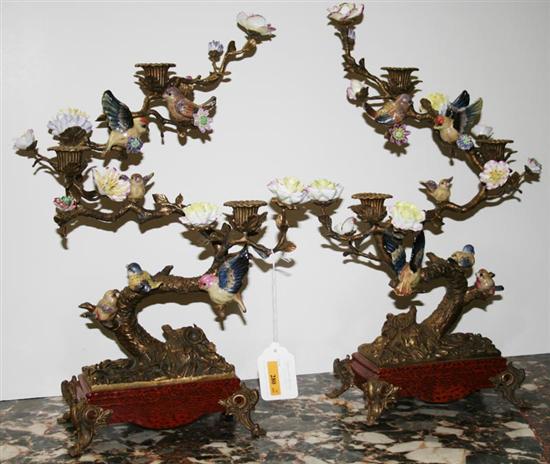 Appraisal: Pair bronze and porcelain candelabra tree branch form supporting three