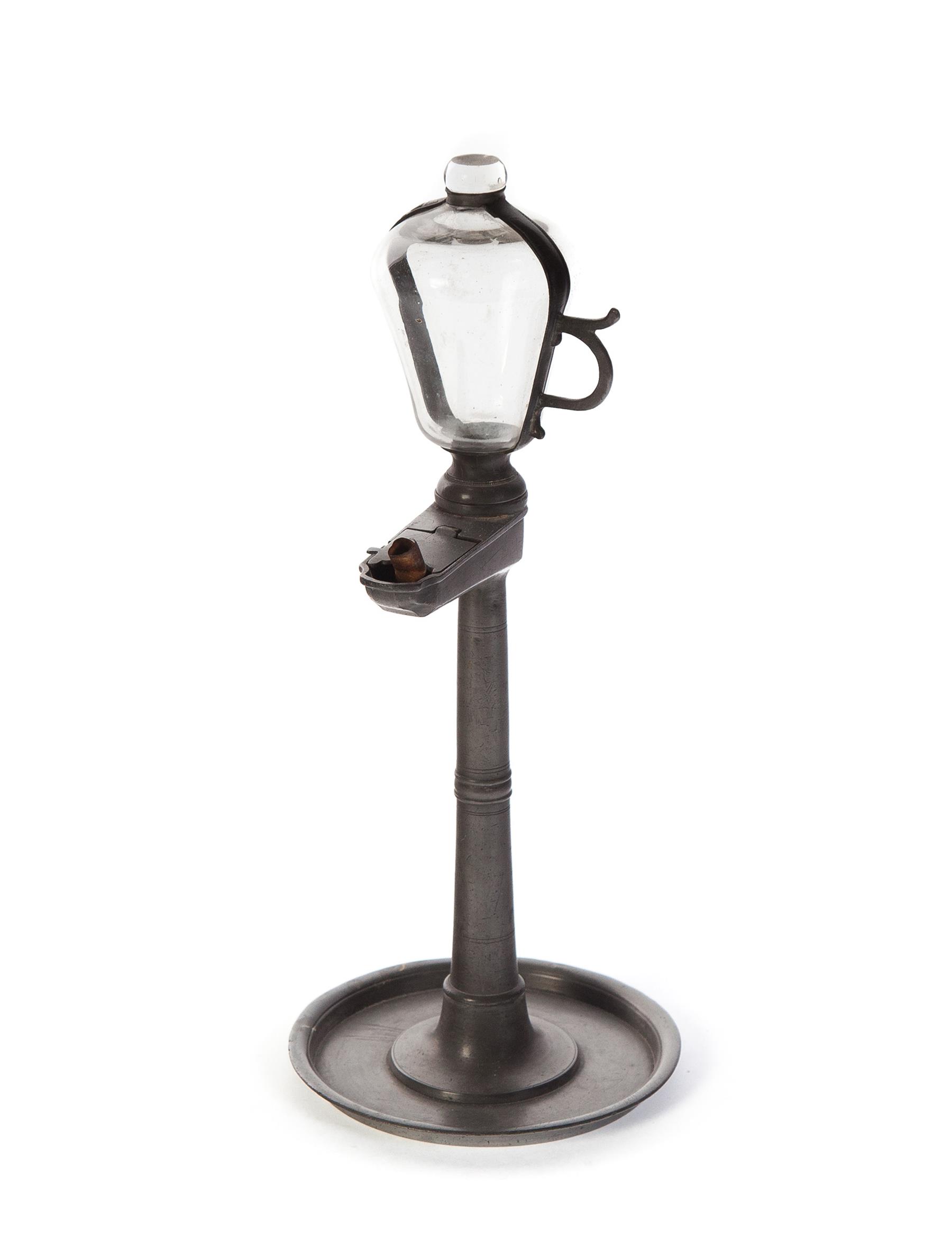 Appraisal: EUROPEAN PEWTER TIME LAMP Mid th century Carden lamp with