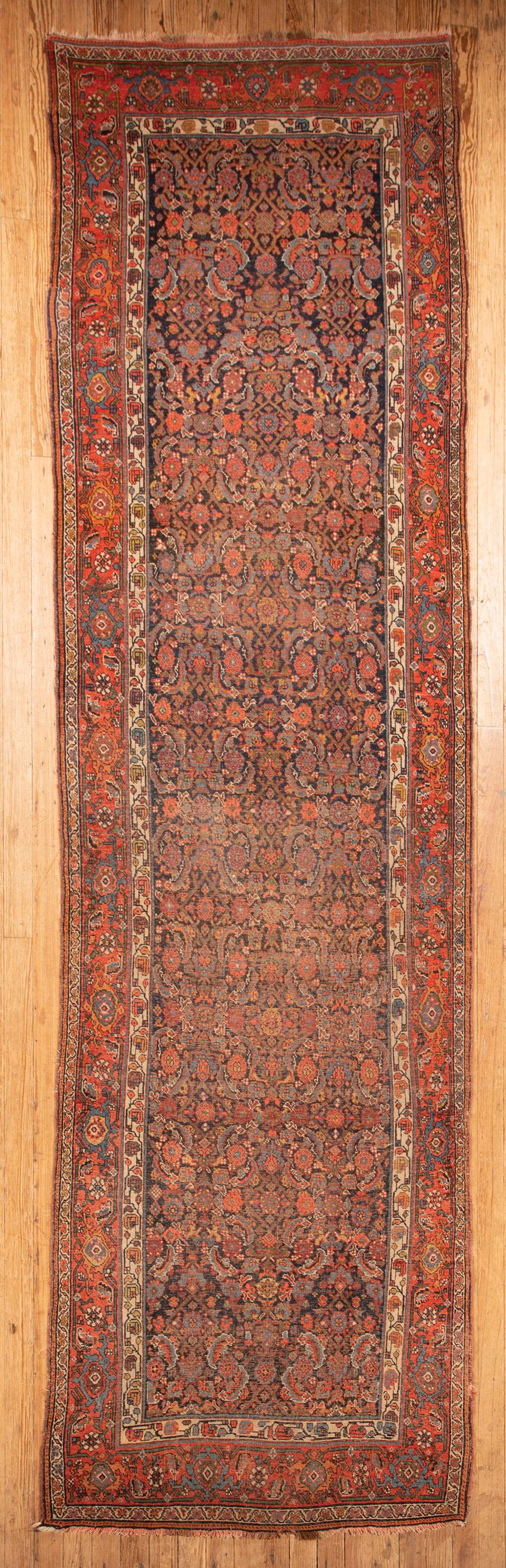 Appraisal: Semi Antique Persian Runner dark blue ground cream border overall