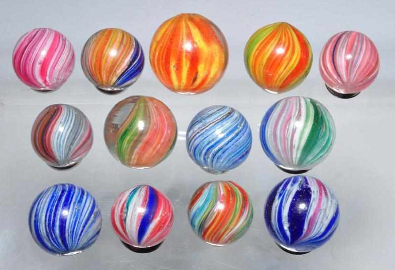 Appraisal: Lot of Onionskin Marbles Description Nice group of multi-colored onionskins