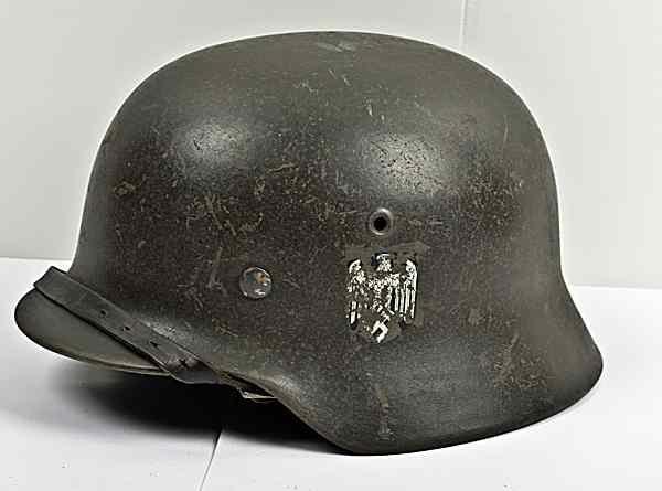 Appraisal: German WWII M- Army Helmet with Two Army Decals This