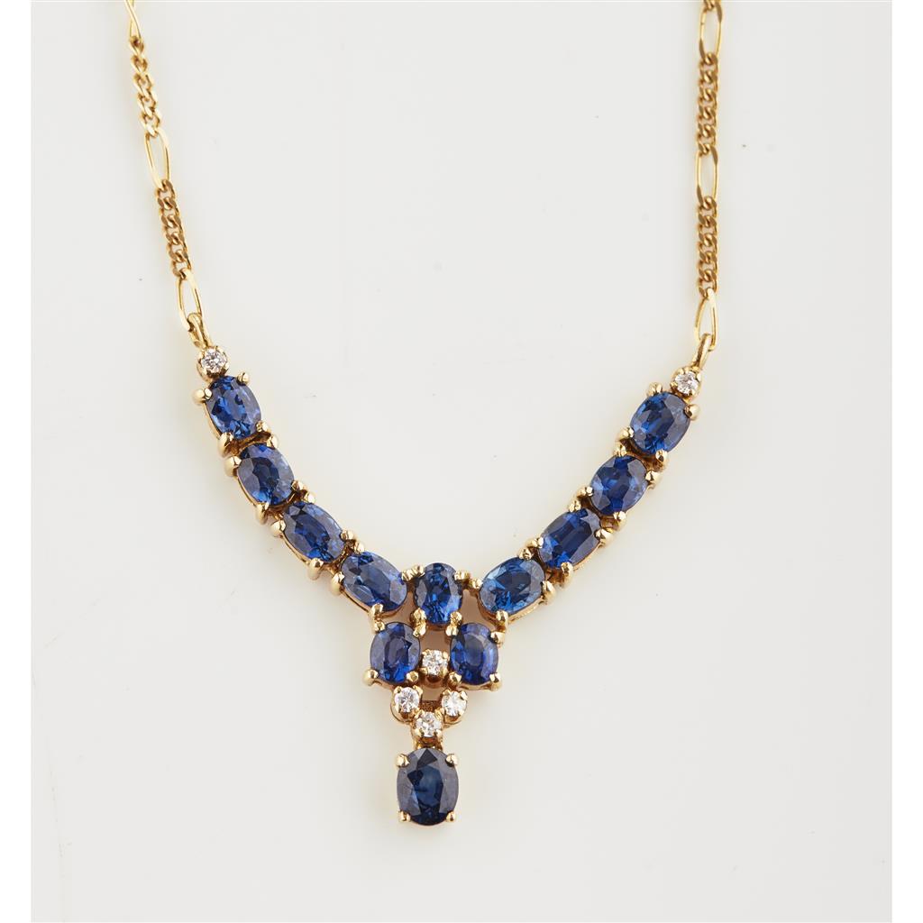 Appraisal: A sapphire and diamond set necklace the curved central motif