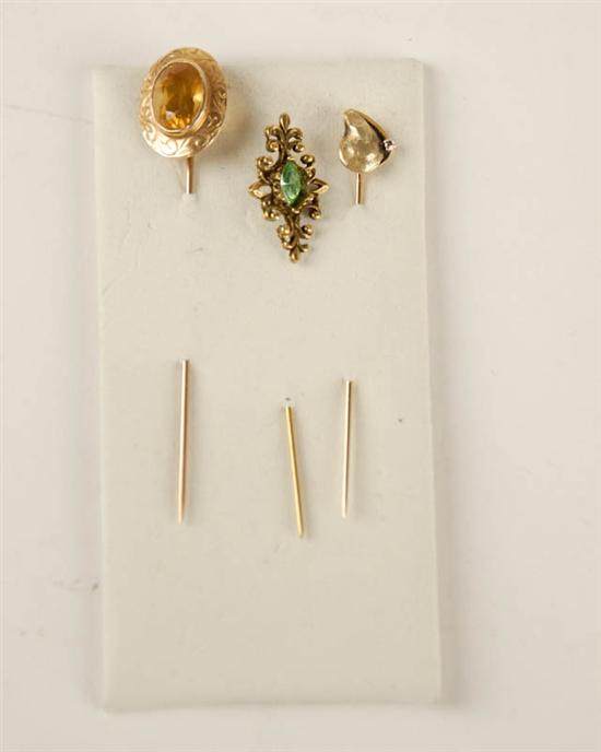 Appraisal: A Lot of Three Jewelry Stickpins an oval faceted citrine