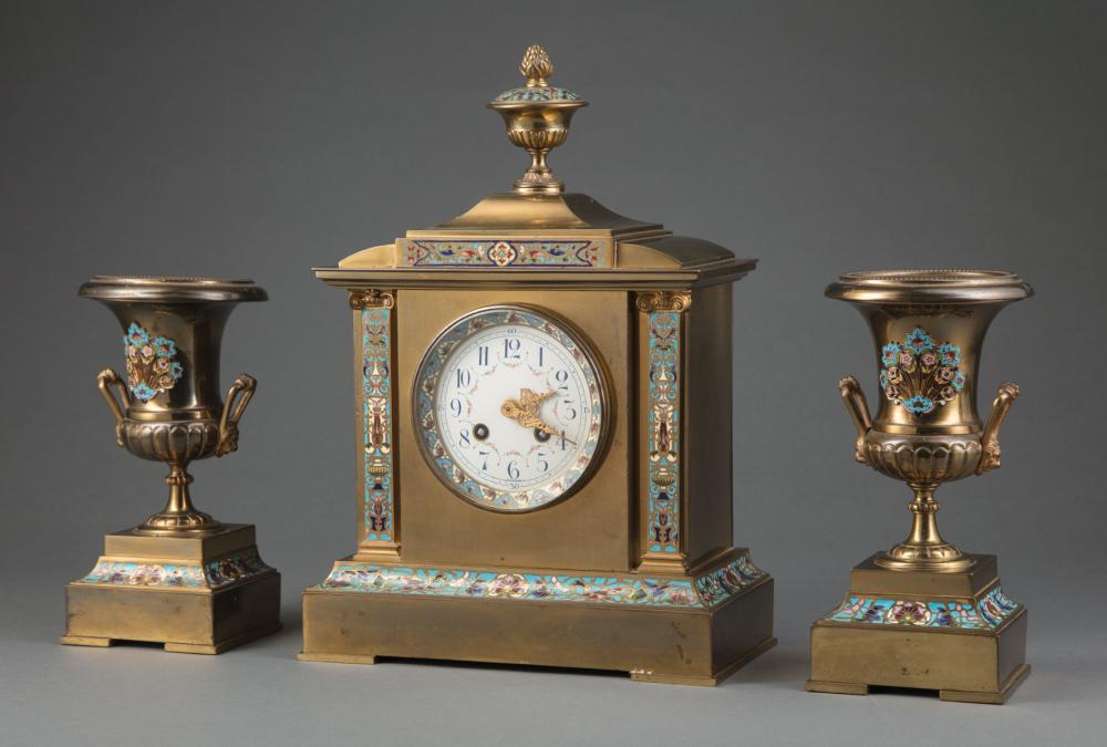 Appraisal: French Brass and Cloisonne Clock Garniture c striking gong movement