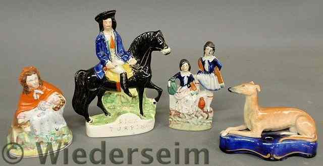 Appraisal: Four Staffordshire figures including Dick Turpin h As found