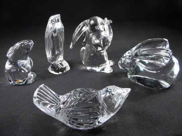 Appraisal: Five crystal animal figurines Includes a Baccarat rabbit sitting on