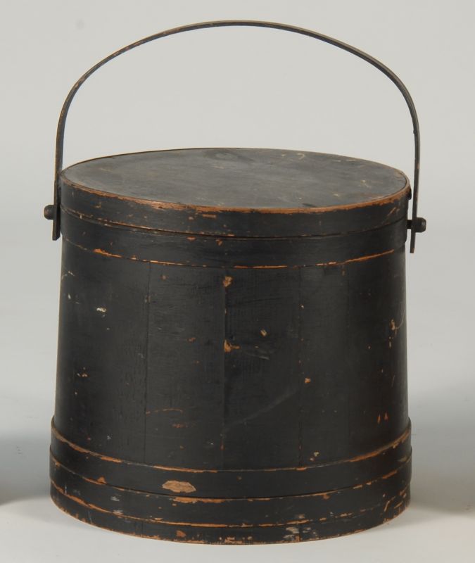 Appraisal: LARGE WOODEN COVERED FIRKIN th CenturyPainted black Bail handle Height