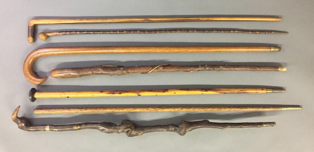 Appraisal: Seven Walking Sticks Seven walking sticks one signed Ebony Jamaica