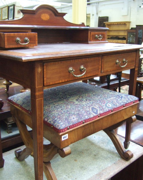 Appraisal: An Edwardian mahogany and satinwood banded writing table the top