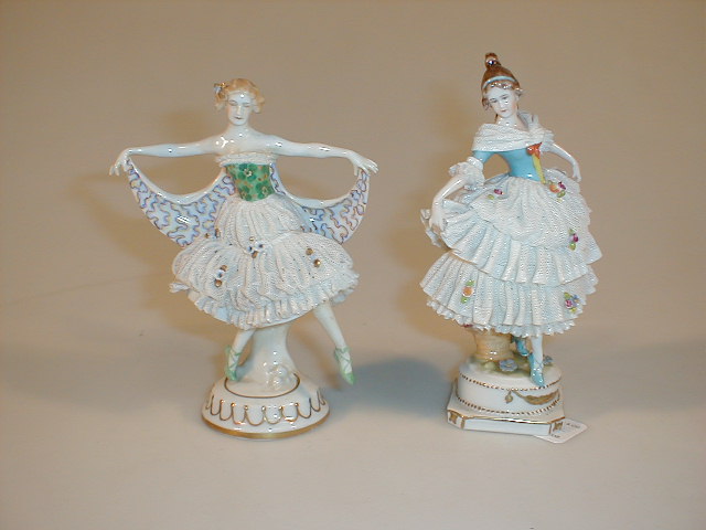 Appraisal: Two Continental porcelain crinoline dancing figures with underglaze blue marks