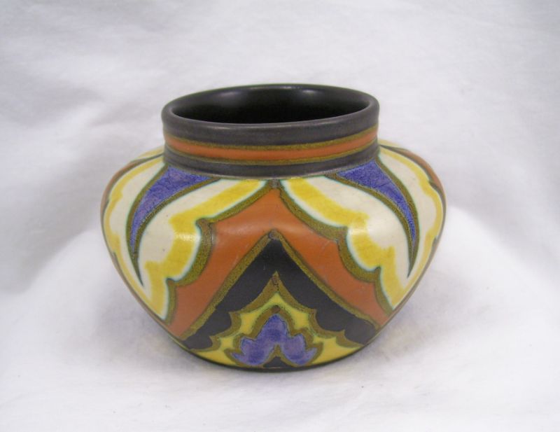 Appraisal: Gouda Pottery Vase Gouda decorated pottery vase with glaze colors