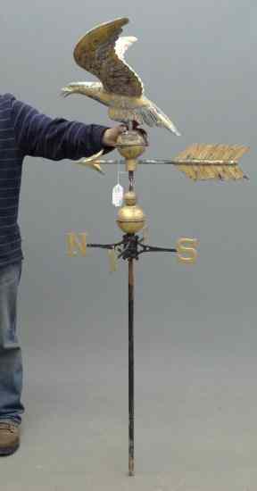 Appraisal: Eagle on ball weathervane with directionals '' Wing Span ''