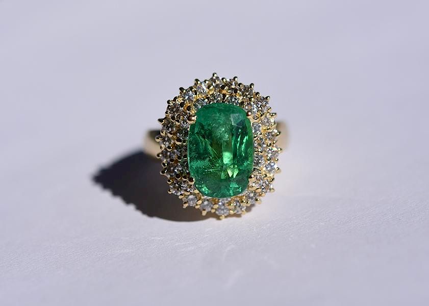 Appraisal: k yellow gold diamond and emerald ring k yellow gold