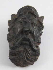 Appraisal: An ancient carved head in terracotta approx cm long