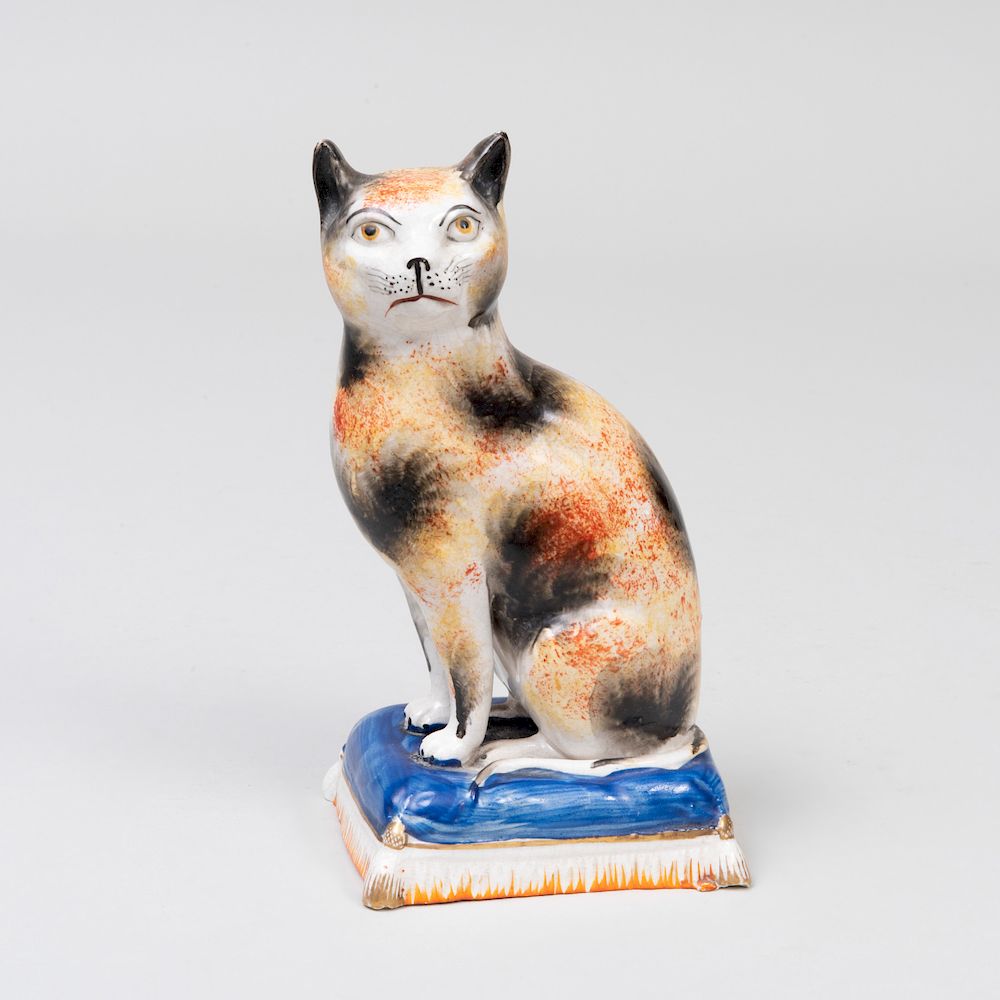 Appraisal: Staffordshire Creamware Model of a Seated Cat in high Property