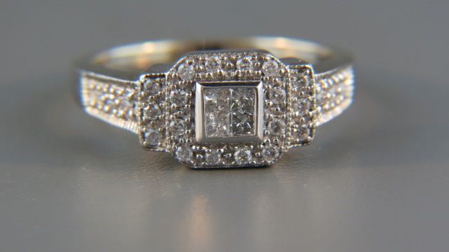 Appraisal: Diamond Ring round princess cut diamonds totaling carat in k