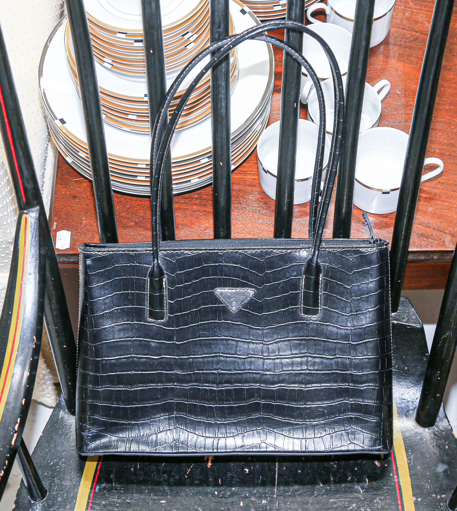 Appraisal: BLACK LEATHER HANDBAG STYLE OF PRADA Modern in L