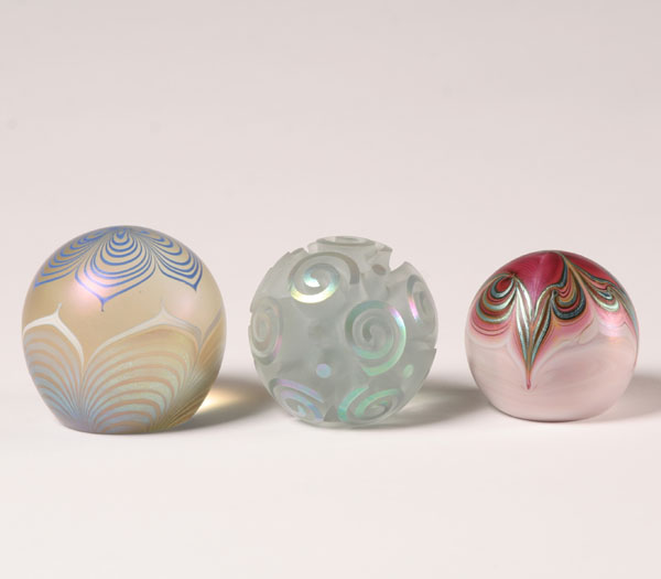 Appraisal: Glass paperweights one Vandemark one Zellique one deeply carved sphere