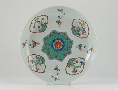 Appraisal: A Chinese famille verte saucer dish painted with flowers inside