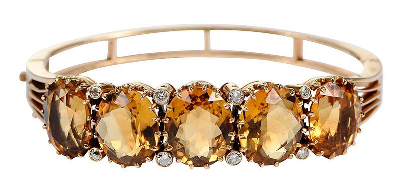 Appraisal: kt Citrine and Diamond Bracelet hinged bangle five oval cut