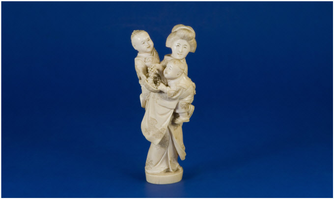 Appraisal: Late th Century Japanese Ivory Figure Woman carrying two children