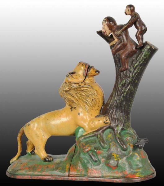 Appraisal: Cast Iron Lion Monkeys Mechanical Bank Description Manufactured by Kyser