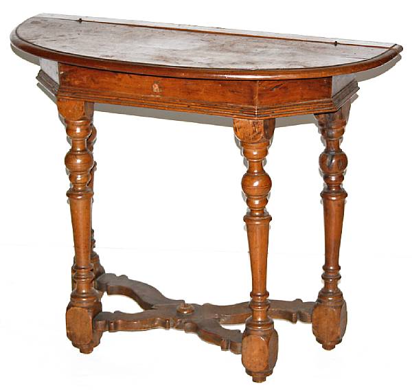 Appraisal: An Italian Renaissance style walnut console table incorporating antique elements