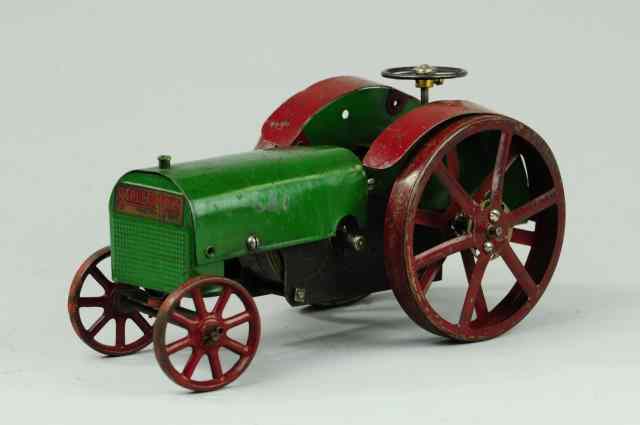 Appraisal: STRUCTO FARM TRACTOR Pressed steel with clockwork motor green tractor