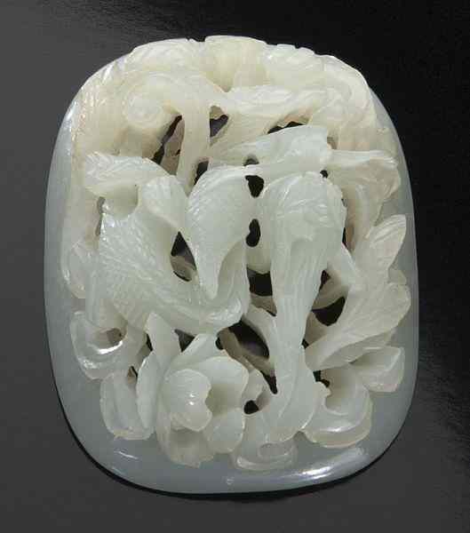 Appraisal: Chinese Ming carved jade plaque the openwork carving depicting dragons