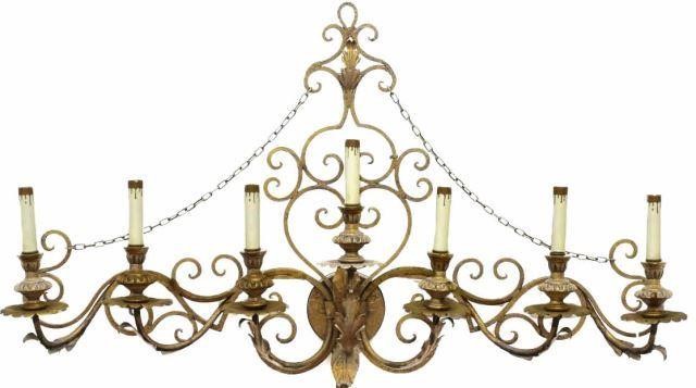 Appraisal: Gilt metal seven-light wall sconce having foliate arms terminating in