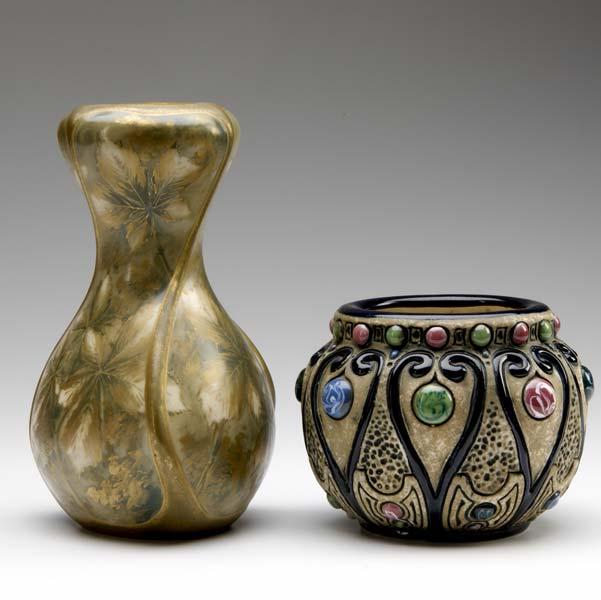 Appraisal: AMPHORA Two pieces one twisted vase with leaves the other