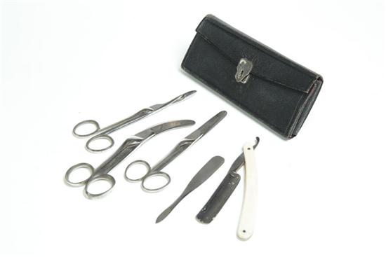 Appraisal: FOLDING SURGICAL KIT France th century leather ivory steel A